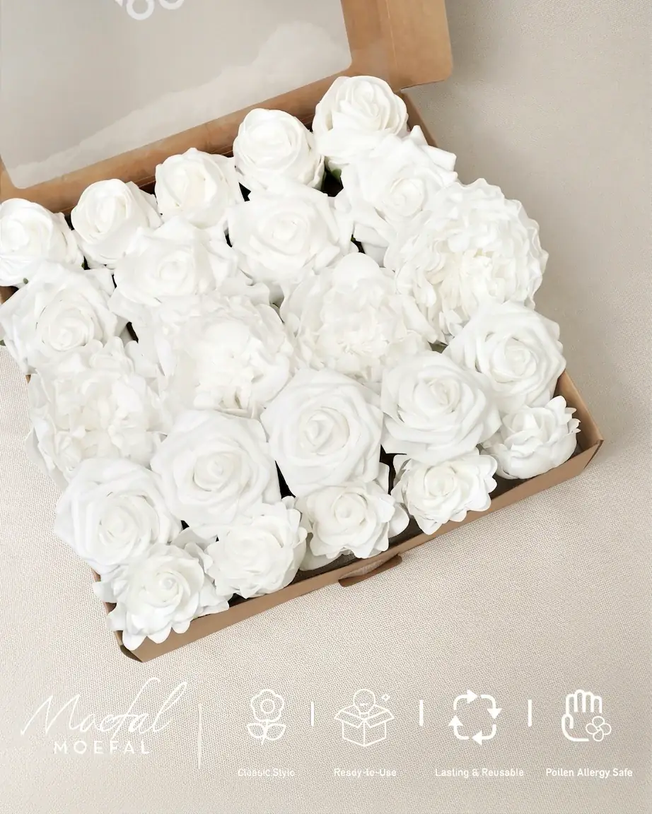 An open cardboard box viewed from above, filled with white peonies and roses heads.