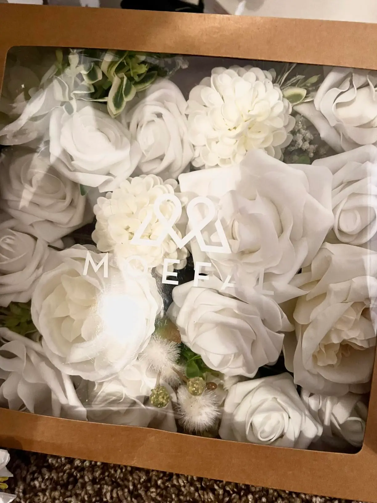 Ivory and white roses, mums and gardenias inside the MOEFAL window gift box