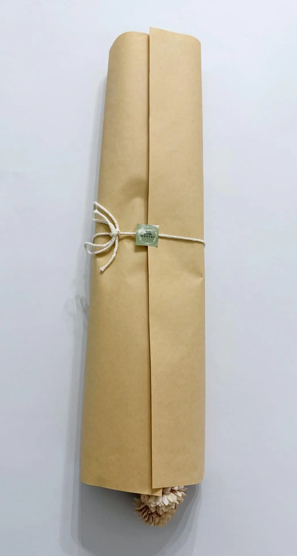 MOEFAL kraft paper wrap with branded tag around the flower stems