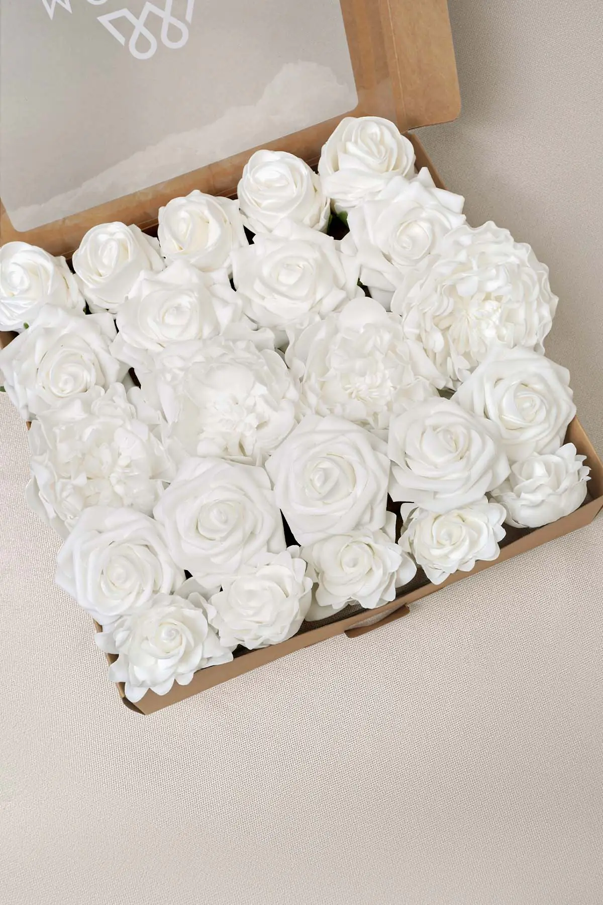 White artificial flower box with faux roses for DIY wedding centerpieces and home decor